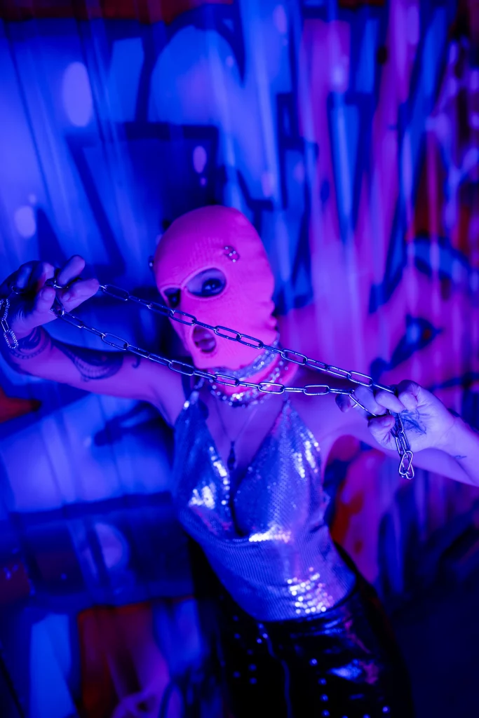 high angle view of provocative woman in balaclava 2024 11 07 14 59 35 utc high angle view of provocative woman in balaclava 2024 11 07 14 59 35 utc